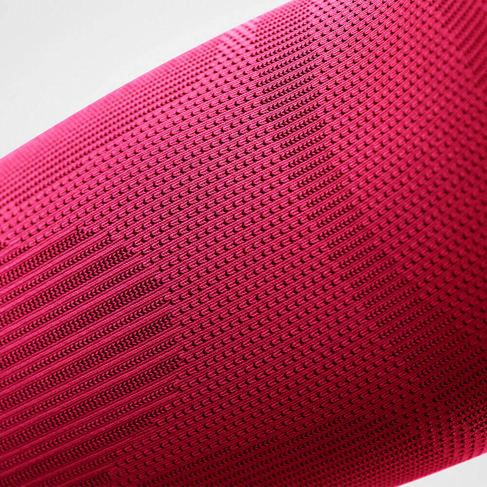 Detailansicht Gestrickverlaufe des pinken Sportsleeves für den Ellenbogen